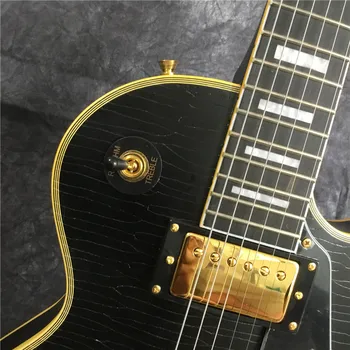 Rūpnīcas vairumtirdzniecības melnā matētā melnā ģitāra. Rožkoka fretboard elektriskā ģitāra, zelta aparatūras